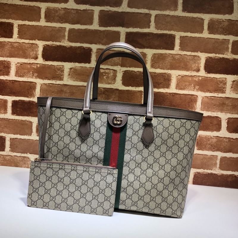 G*u*i shopping bags
